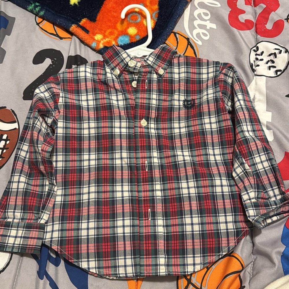 18 month button up. No tears, no stains and pet free